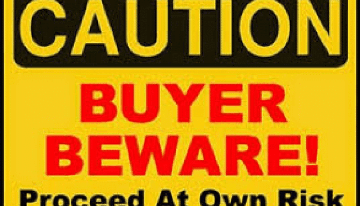 A yellow and black sign with the words " caution buyer beware ".