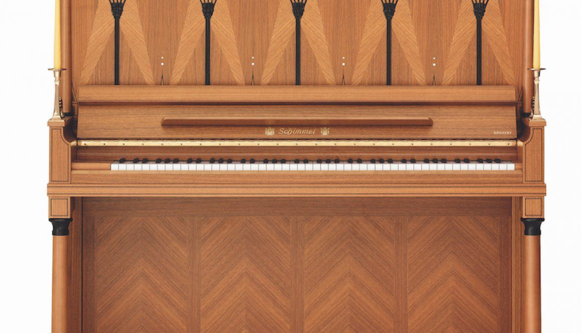 A piano that is sitting on top of a table.