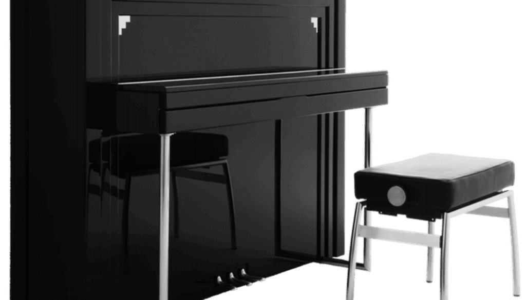 A black piano and stool are shown in this image.