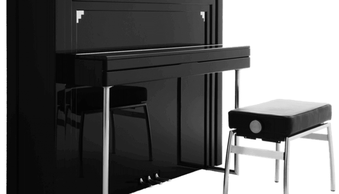 A black piano and stool are shown in this image.