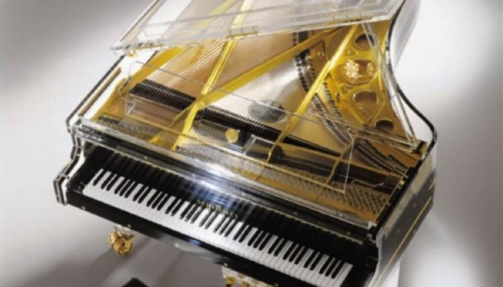 A piano that is sitting in the middle of a room.