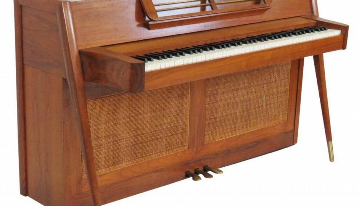 A piano that is sitting on top of a table.