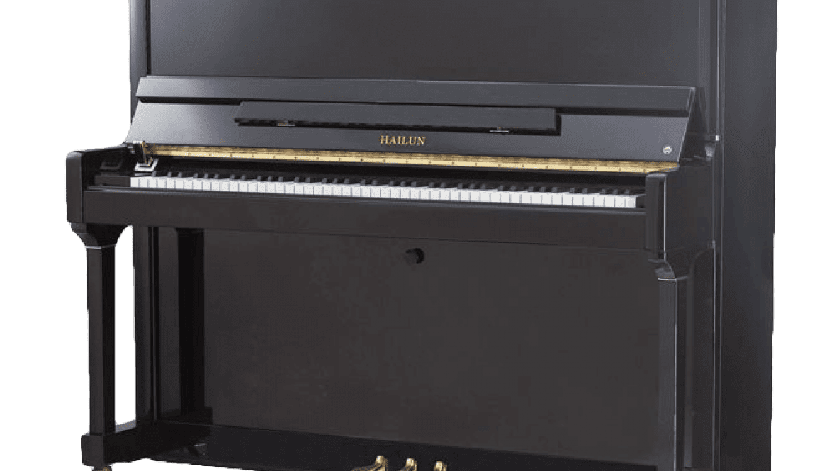 A black upright piano with its door open.