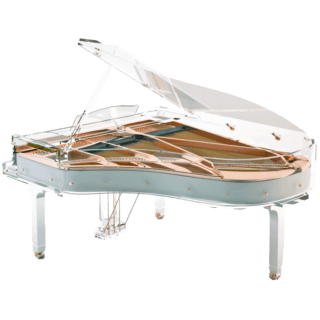 A white piano with wooden parts on top of it.