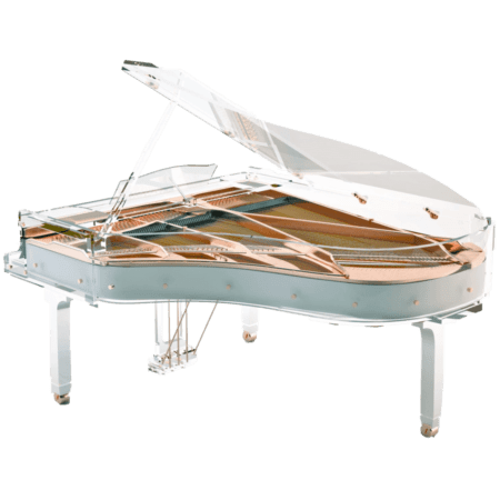 A white piano with wooden parts on top of it.