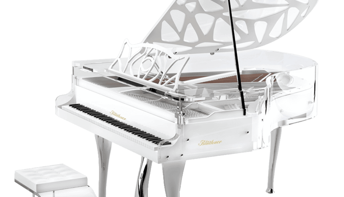 A white piano with a bench on top of it.