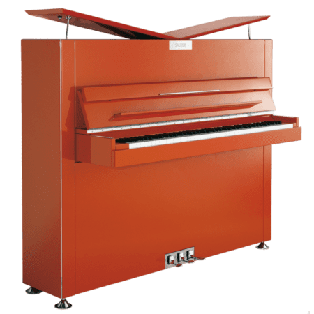 A red piano with a wooden top on it.