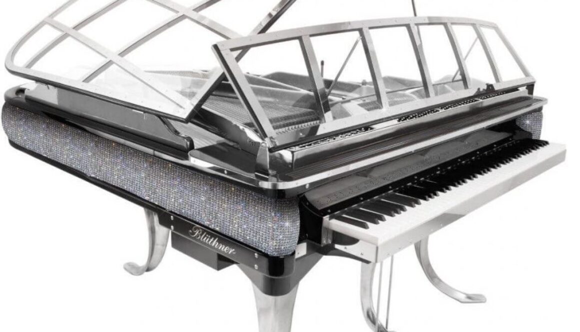 A piano with a glass top on it