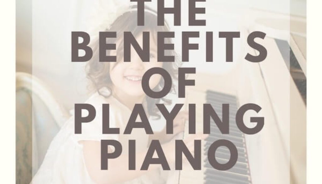 A woman is smiling and holding her piano.